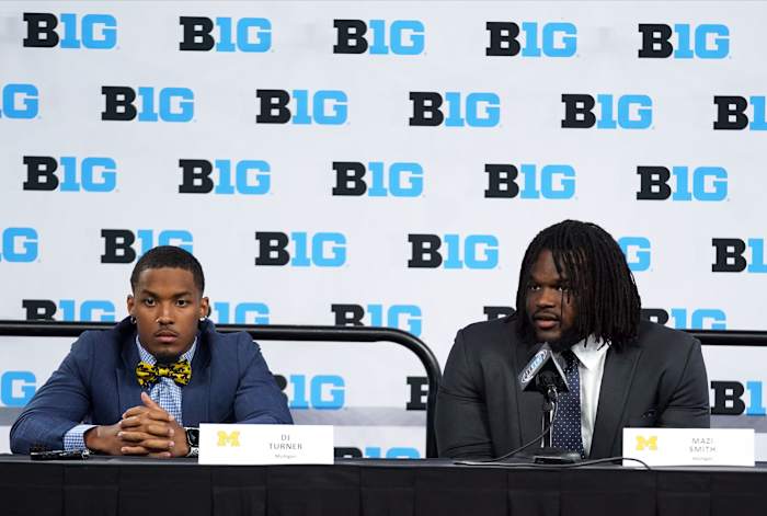 Michigan Wolverines defensive back DJ Turner and defensive tackle Mazi Smith